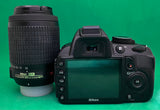 NIKON D3100 + 2 lenses 18-55mm & 55-200mm  DIGITAL SLR CAMERA ( used)